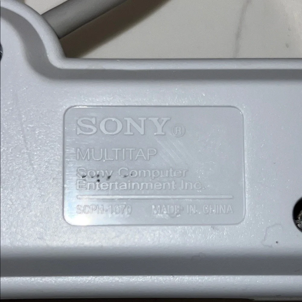 Sony PlayStation Gray Multi-Tap Adapter
